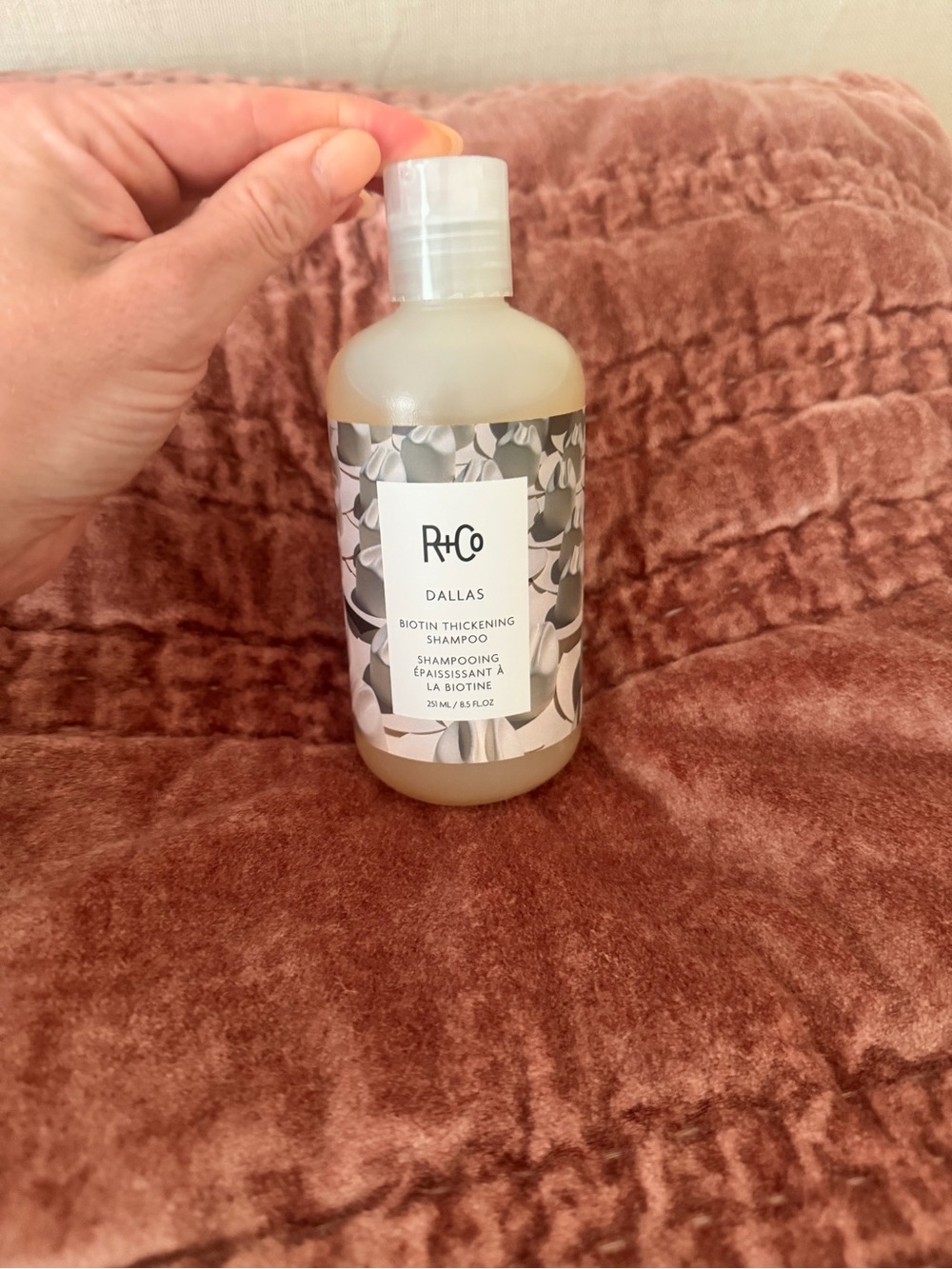 R+Co Dallas Biotin Thickening Shampoo - Beige with Gray Floral Label